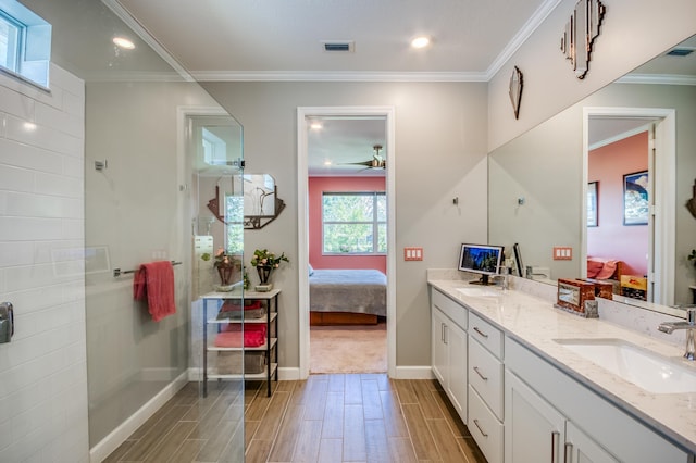 1360 Wandering Willow Way, The Acreage, FL 33470 - ensuite bathroom featuring double vanity, wood finished floors, a ceiling fan, a walk in shower, and baseboards