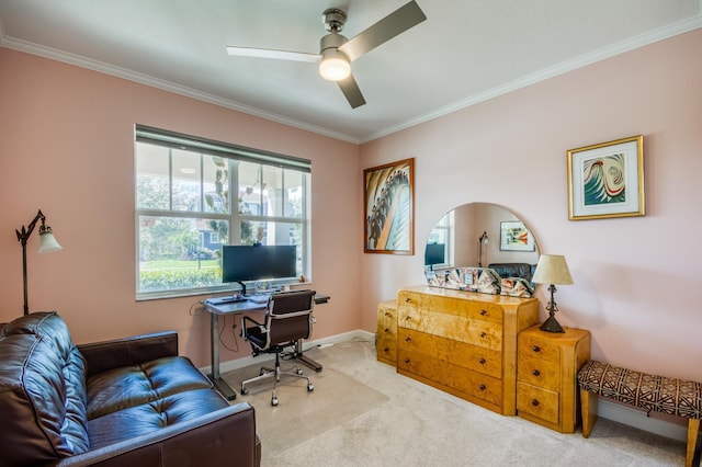 home office with carpet flooring, crown molding, baseboards, and ceiling fan