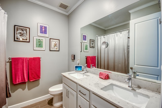 full bath featuring toilet, a sink, visible vents, and crown molding