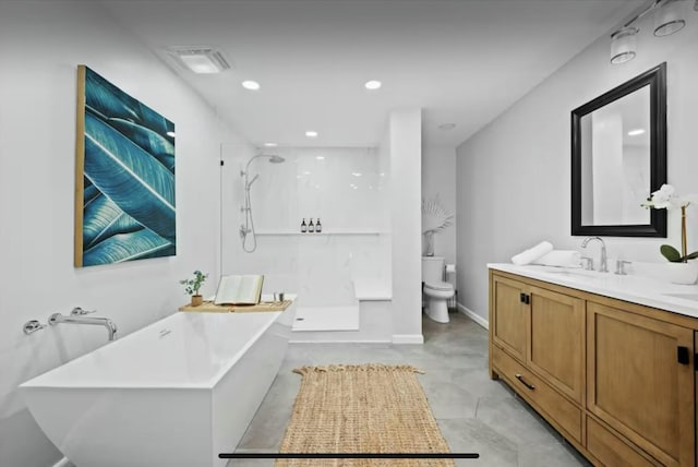 bathroom featuring visible vents, toilet, a soaking tub, vanity, and a walk in shower