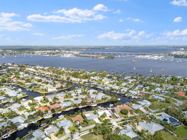 birds eye view of property featuring a residential view and a water view