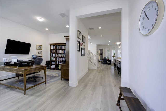 office area featuring recessed lighting, visible vents, light wood-style flooring, and baseboards