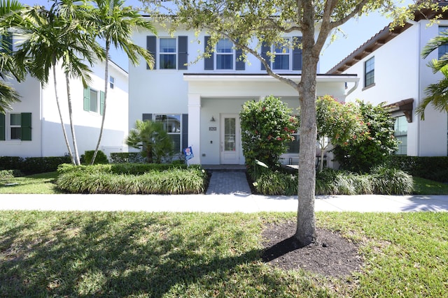 view of front of home featuring stucco siding