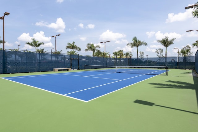 view of sport court featuring community basketball court and fence