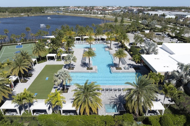 birds eye view of property featuring a water view