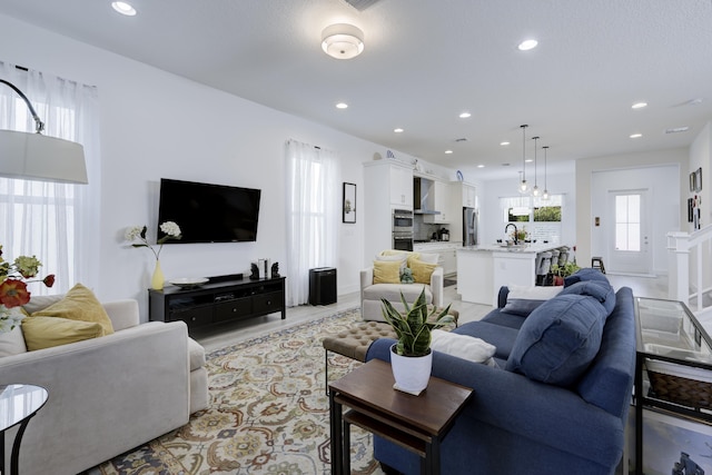 living area with recessed lighting