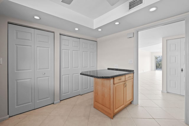 kitchen featuring recessed lighting, light tile patterned flooring, and visible vents