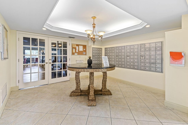 interior space with french doors, visible vents, and mail area