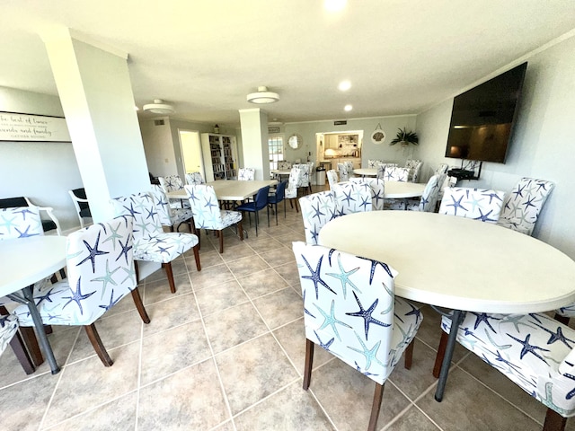 tiled dining space featuring visible vents and recessed lighting