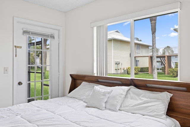 218 SE Village Dr Unit 218, Port Saint Lucie, FL 34952 - bedroom with access to outside