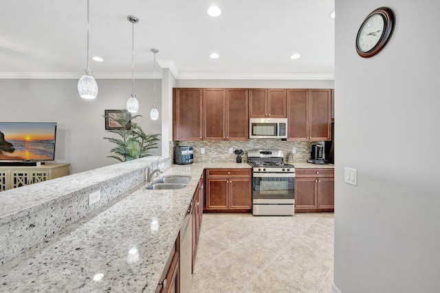 kitchen featuring ornamental molding, light stone counters, decorative backsplash, stainless steel appliances, and a sink