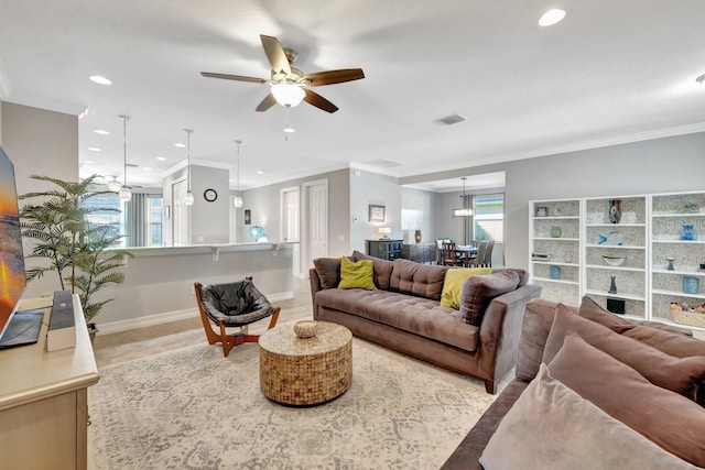 living room with recessed lighting, visible vents, ornamental molding, and ceiling fan with notable chandelier