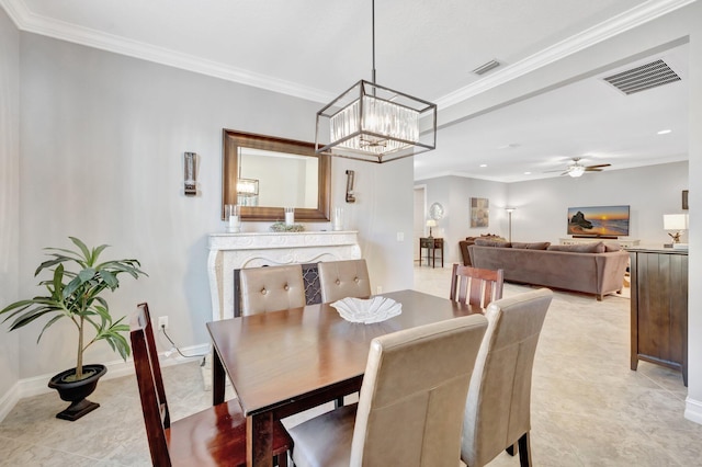 dining area featuring ceiling fan, visible vents, and ornamental molding