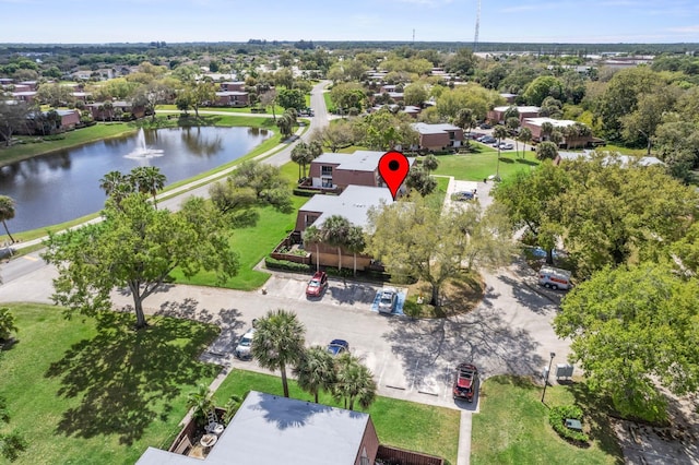 drone / aerial view with a water view