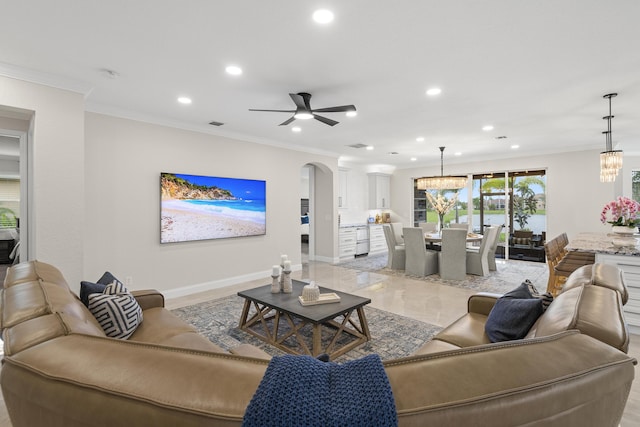 living room featuring recessed lighting, baseboards, arched walkways, and ornamental molding