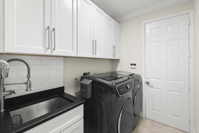 4113 Worlington Ter, Fort Pierce, FL 34947 - washroom with cabinet space, washing machine and dryer, and ornamental molding