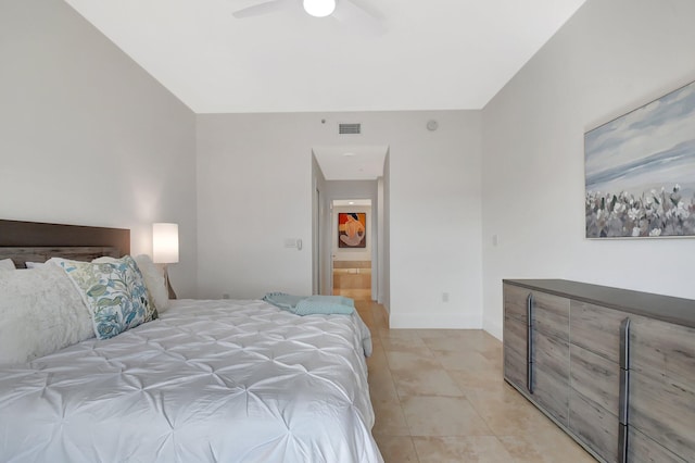 bedroom featuring light tile patterned floors, ceiling fan, visible vents, and baseboards