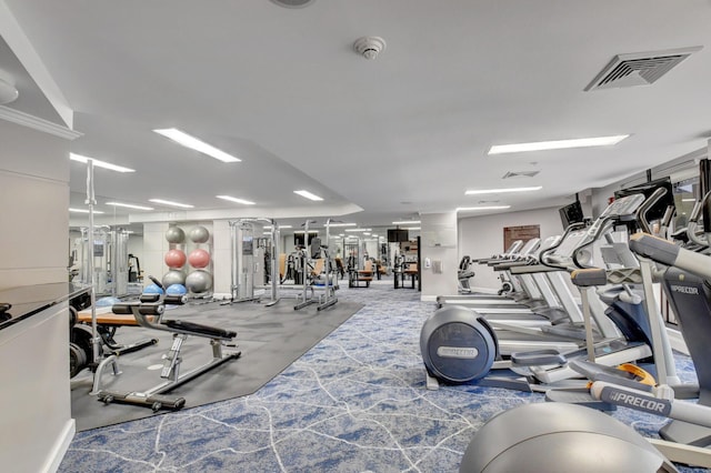 exercise room featuring visible vents