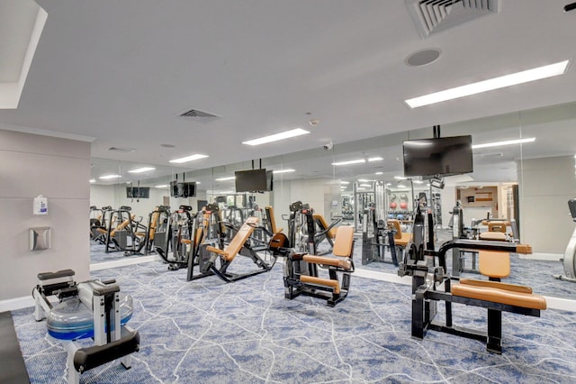 gym featuring visible vents and baseboards