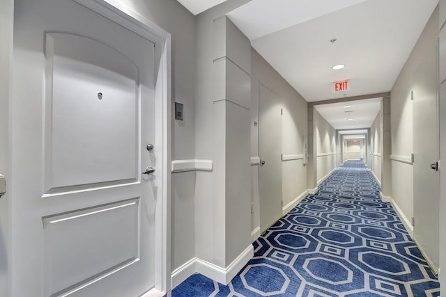 corridor featuring baseboards