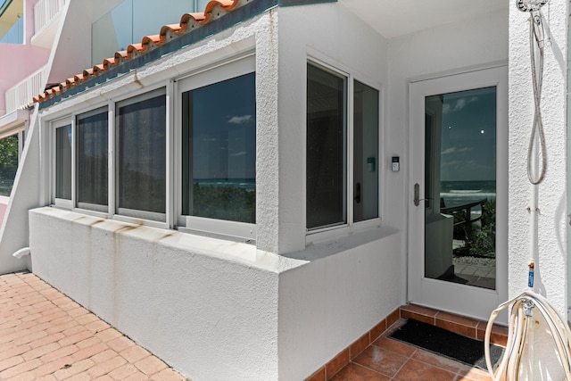 view of side of home featuring stucco siding