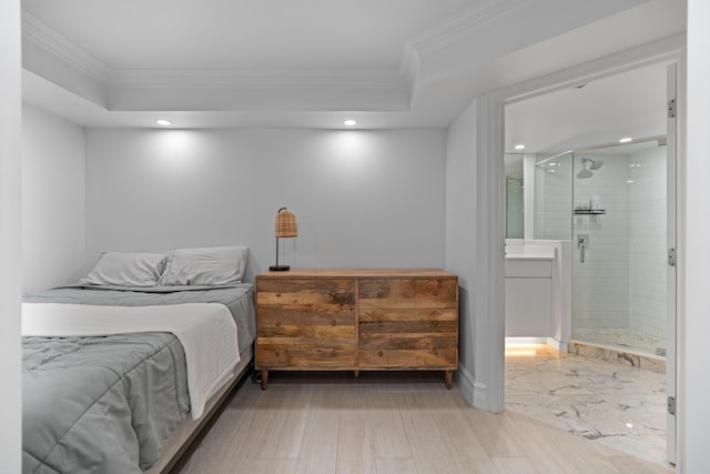 bedroom featuring connected bathroom, recessed lighting, crown molding, and baseboards