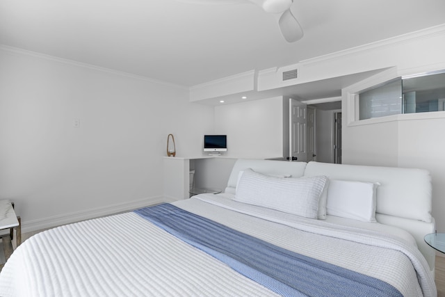 bedroom featuring baseboards, visible vents, and ornamental molding