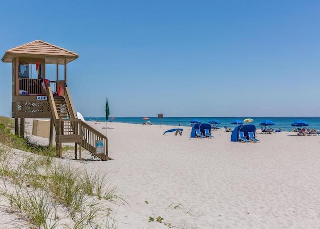 property view of water with a beach view