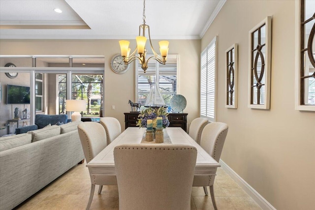 dining space featuring a notable chandelier, recessed lighting, baseboards, and crown molding