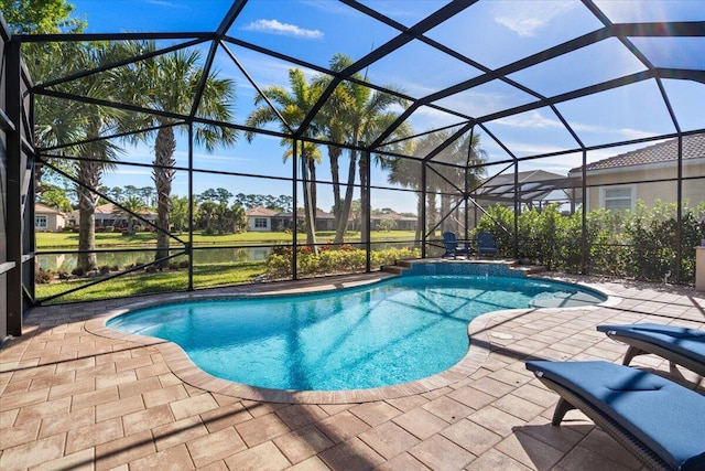 pool featuring a lanai and a patio area