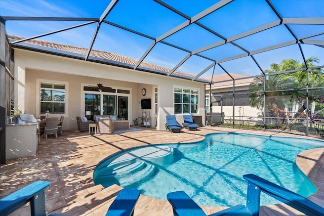 view of pool featuring a fenced in pool, a patio, a ceiling fan, a lanai, and an outdoor living space