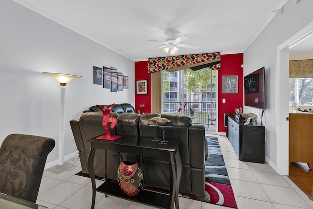 living area with crown molding, baseboards, and light tile patterned floors