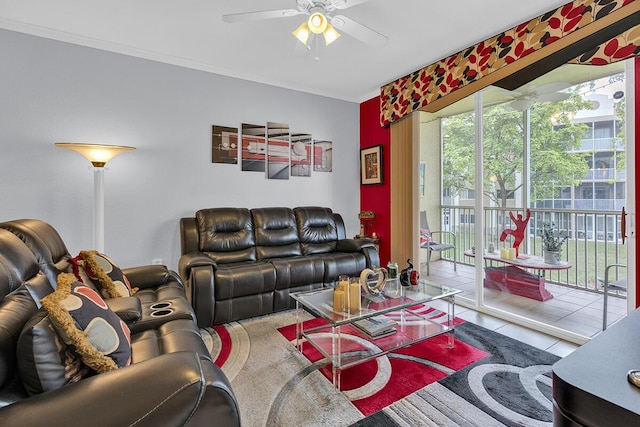 tiled living area with a ceiling fan and crown molding