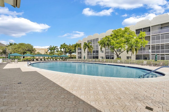 community pool with a patio