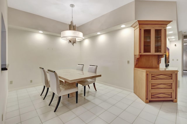 dining room featuring recessed lighting and baseboards