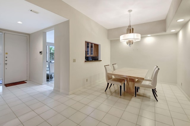 dining space with light tile patterned floors, recessed lighting, visible vents, baseboards, and an inviting chandelier