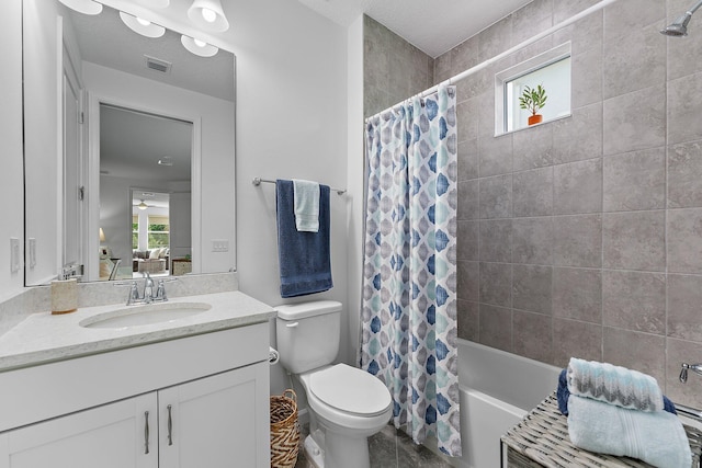 full bathroom with visible vents, toilet, vanity, and shower / bathtub combination with curtain