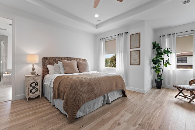 bedroom featuring light wood-type flooring, visible vents, a ceiling fan, recessed lighting, and baseboards