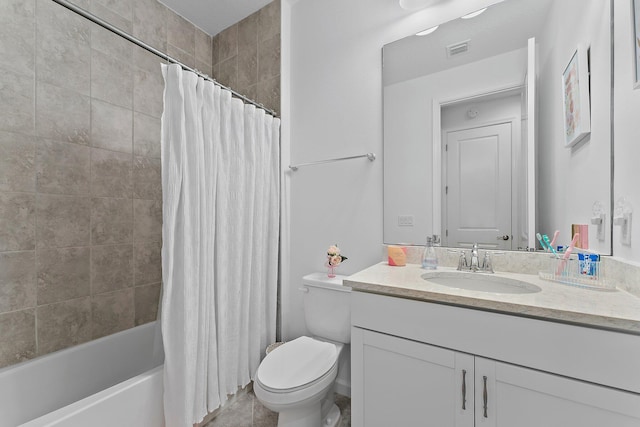 bathroom with visible vents, shower / tub combo, toilet, and vanity