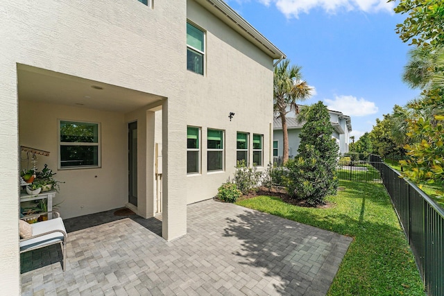 view of patio with fence