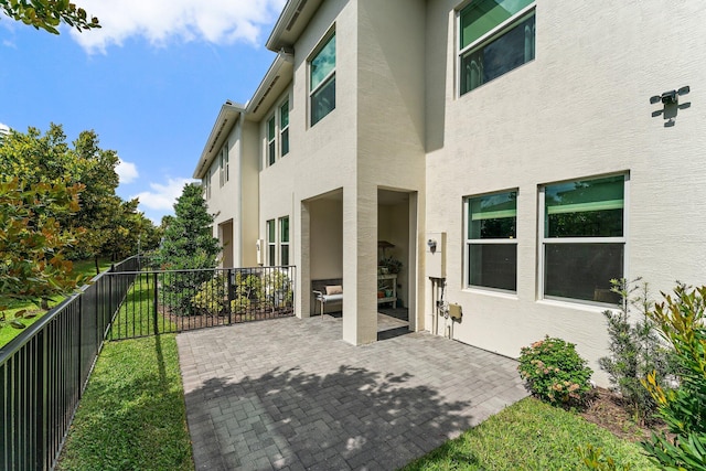 view of patio featuring fence