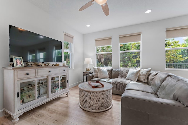 living area with recessed lighting, light wood-style flooring, a healthy amount of sunlight, and ceiling fan