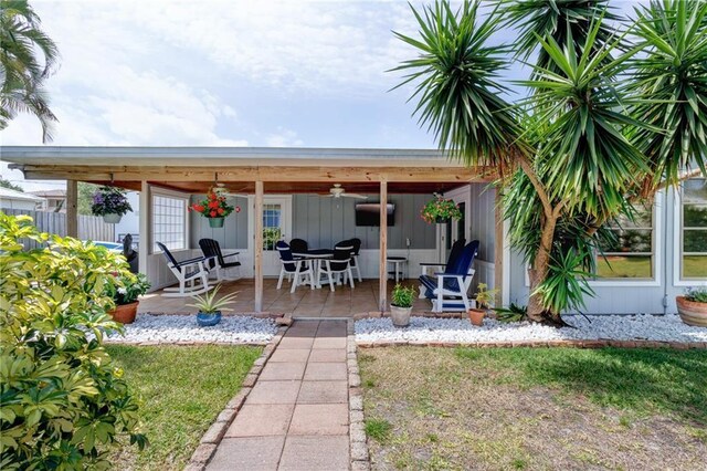 view of patio / terrace featuring a ceiling fan