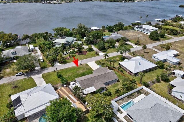 aerial view featuring a residential view and a water view