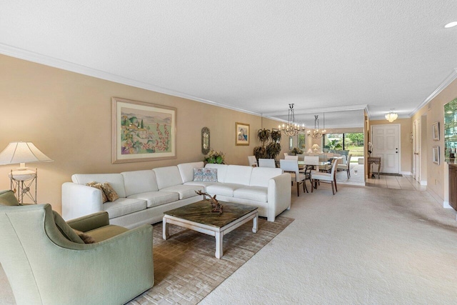 living area with a notable chandelier, ornamental molding, a textured ceiling, baseboards, and light colored carpet