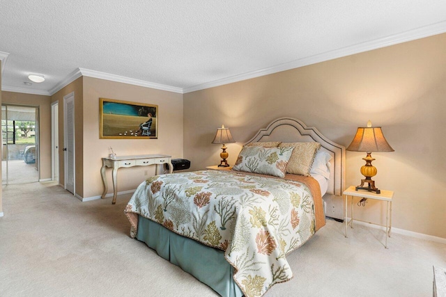 bedroom featuring baseboards, carpet, ornamental molding, and a textured ceiling