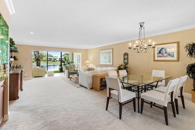 dining area with crown molding, baseboards, light carpet, an inviting chandelier, and a textured ceiling