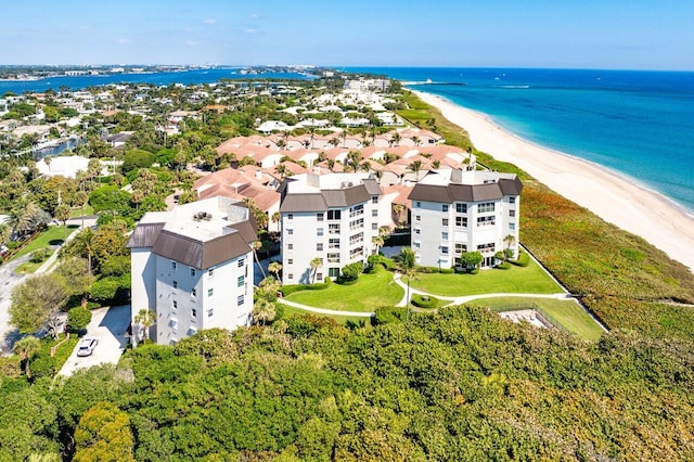 bird's eye view with a beach view and a water view