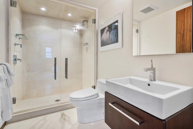 bathroom featuring vanity, visible vents, recessed lighting, a shower stall, and toilet