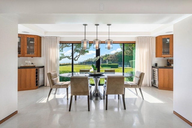 dining room with wet bar, wine cooler, and plenty of natural light